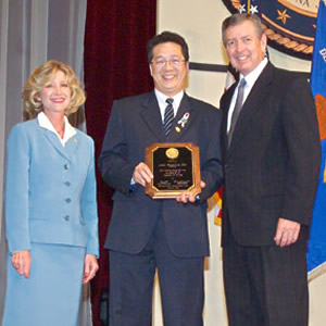 Alan Ping-Lun Lai with Deborah Daniels and John Ashcroft