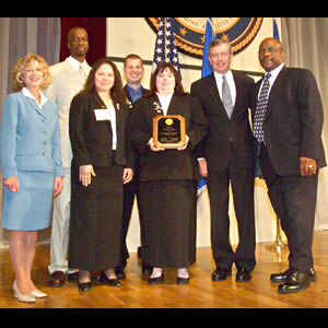 Project Ujima staff accompanied by Deborah Daniels and John Ashcroft