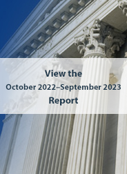 Building with large columns. Text on image reads: View the October 2022-September 2023 Report