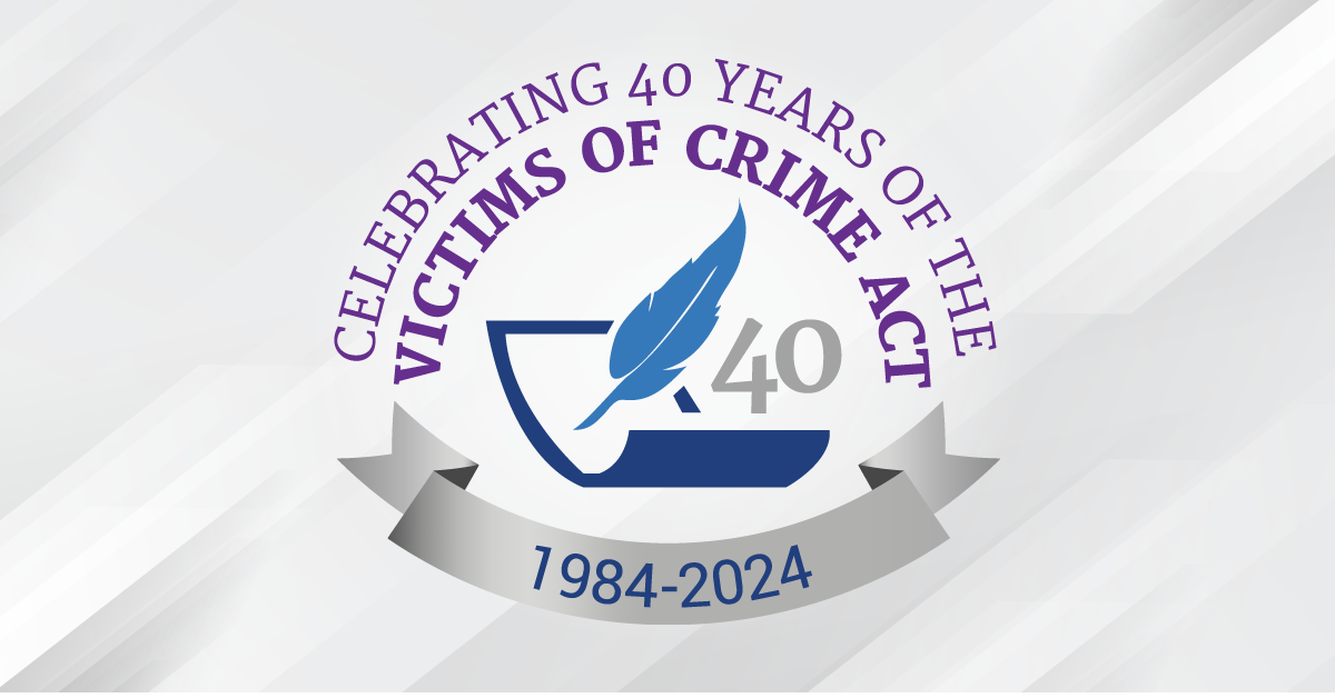 VOCA 40th Anniversary Logo featuring a quill next to the number 40, both above a piece of paper.