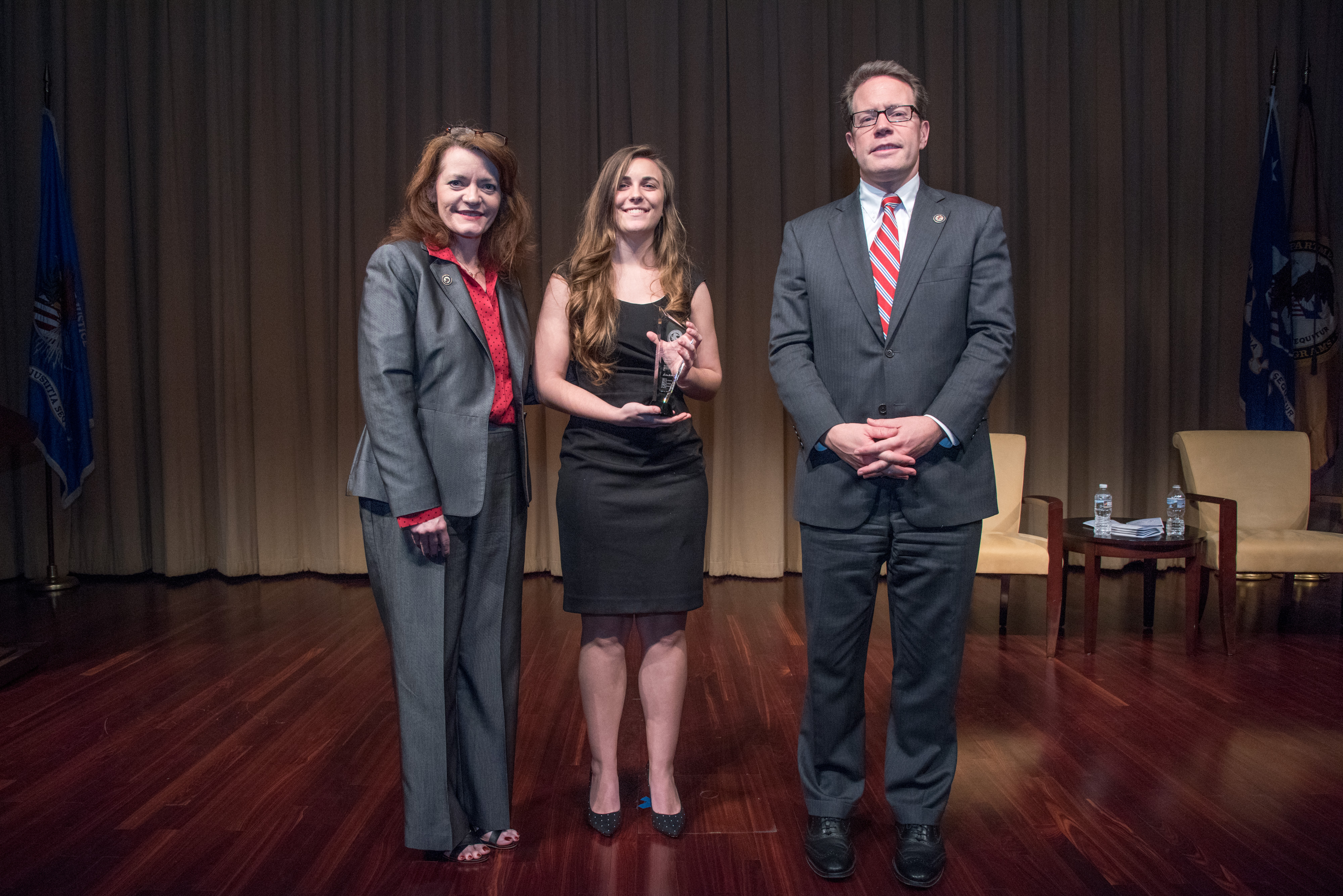 2018 Volunteer for Victims Award recipient Shelby Kay Looper with (from left) OVC Director Darlene Hutchinson and Principal Deputy Assistant Attorney General for the Office of Justice Programs Alan Hanson.