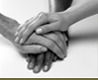 Photo of hands on top of each other.