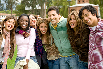 Group of young men and women smiling and laughing