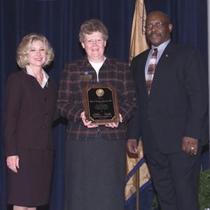 Sister M. Marcian Deisenroth accompanied by John Gillis and Deborah Daniels