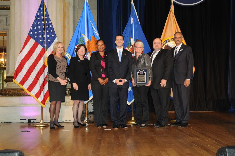 Staff from the Financial Compliance Unit of the Maricopa County Adult Probation Department accept the 2012 Crime Victims Financial Restoration Award.