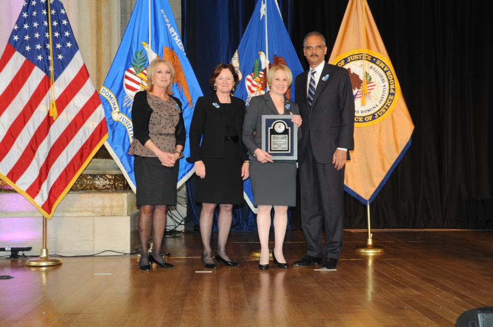 2012 Allied Professional Award recipient Dr. Dora Schriro with (from left) Joye E. Frost, Acting Director, Office for Victims of Crime; Acting Assistant Attorney General Mary Lou Leary, Office of Justice Programs; and U.S. Attorney General Eric H. Holder, Jr.