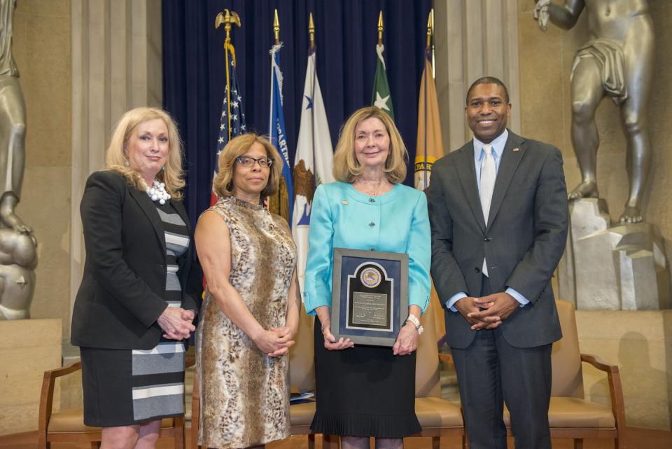 2014 Ronald Wilson Reagan Public Policy Award recipient Pat Tuthill with (from left) Joye E. Frost, Director, Office for Victims of Crime; Karol V. Mason, Assistant Attorney General, Office of Justice Programs; and Associate Attorney General Tony West.