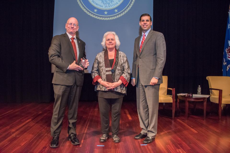 2017 Allied Professional Award recipient Captain Michael Holt with (from left) Acting OVC Director Marilyn McCoy Roberts and Acting Associate Attorney General Jesse Panuccio.