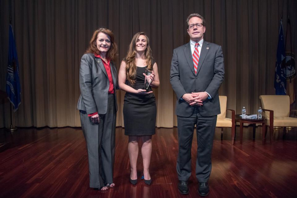 2018 Volunteer for Victims Award recipient Shelby Kay Looper with (from left) OVC Director Darlene Hutchinson and Principal Deputy Assistant Attorney General for the Office of Justice Programs Alan Hanson.