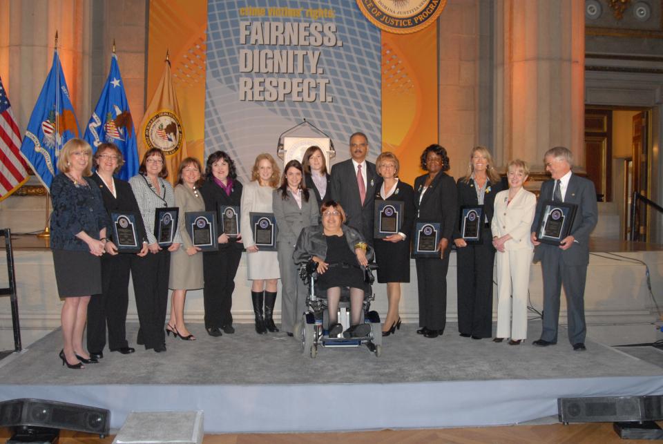 The 2010 National Crime Victims' Service Awards recipients on stage.