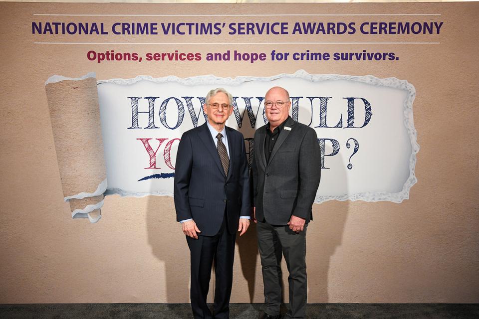 Dr. Chan Hellman with Attorney General Merrick B. Garland at the 2024 National Crime Victims' Rights Week Candlelight Vigil.