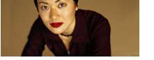 Photo of an Asian woman looking at the camera.