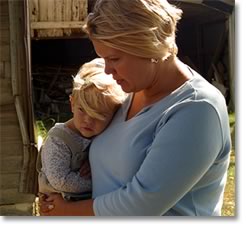 Photo of mother holding her child