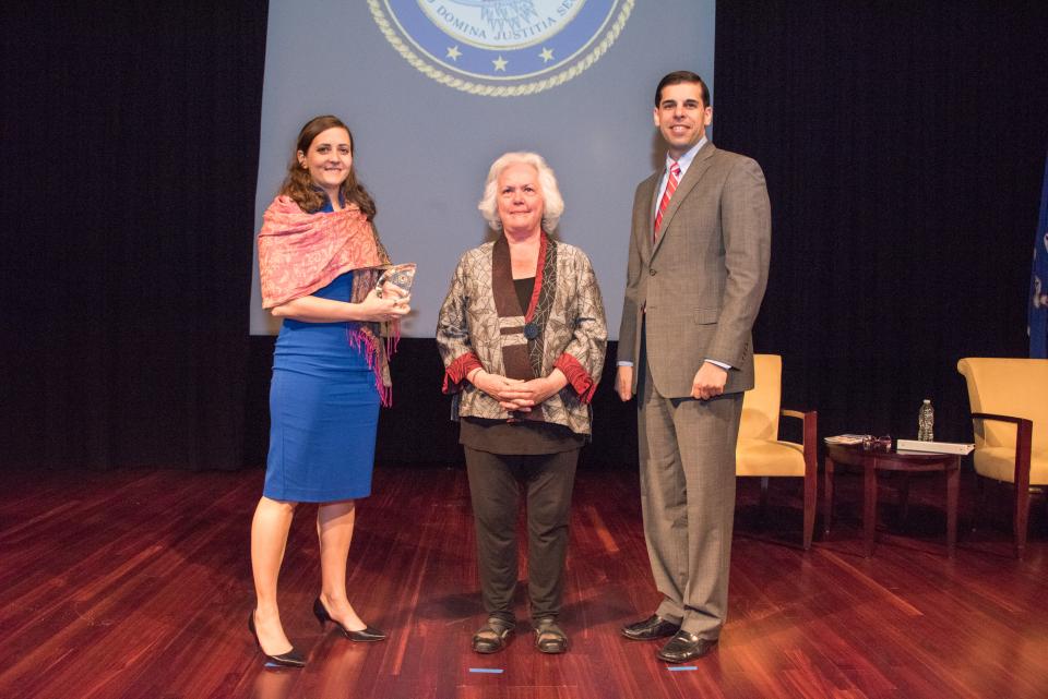 2017 Special Courage Award recipient Laura L. Dunn, Esq. with (from left) Acting OVC Director Marilyn McCoy Roberts and Acting Associate Attorney General Jesse Panuccio.