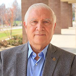 John P. J. Dussich